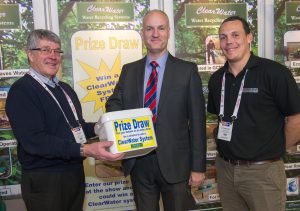 34 highspeed BIGGA's Jim Croxton with Highspeed's David Mears (left) and Matthew Mears (right) pulls out the winning entry