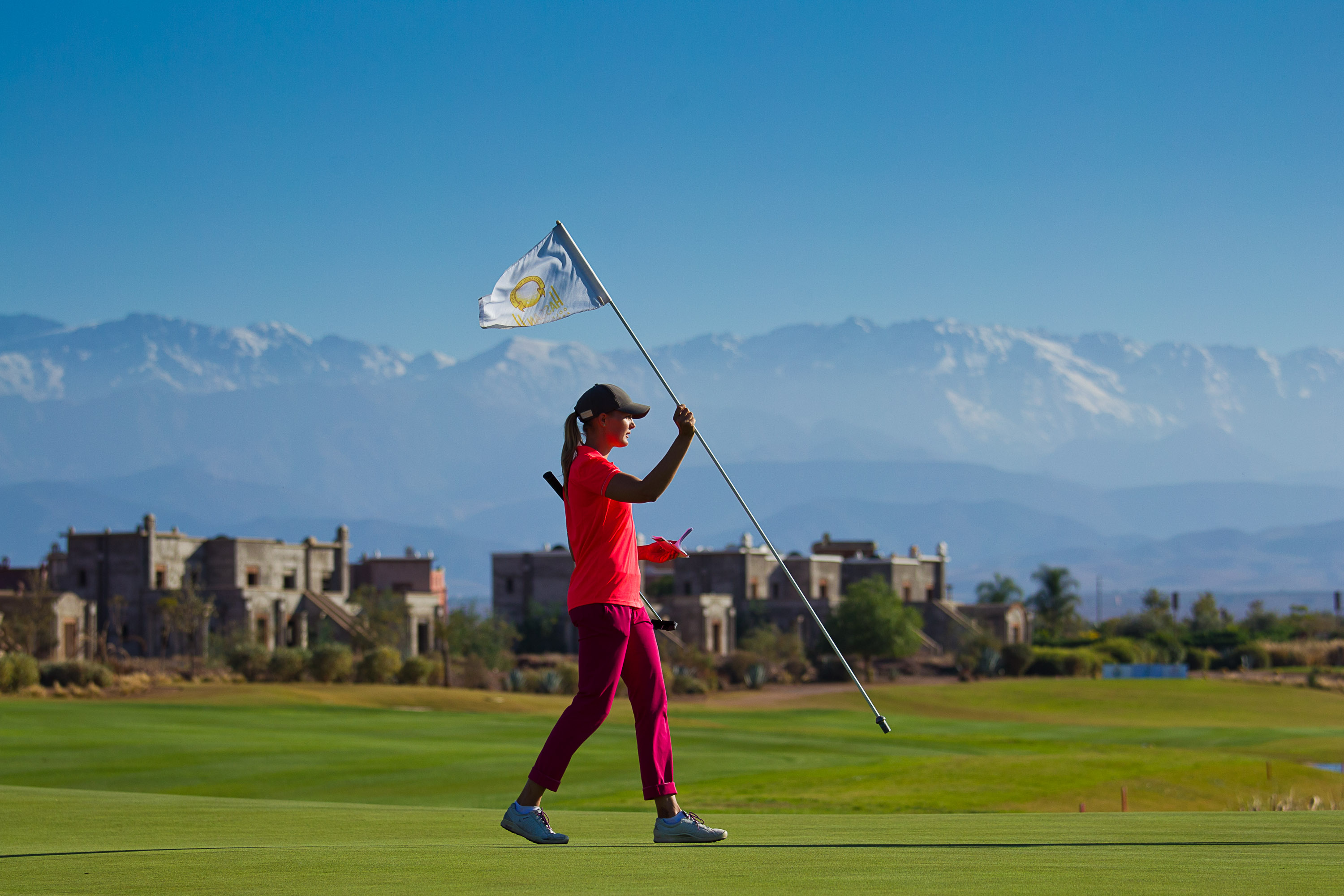 Golf club bans touching of the flag