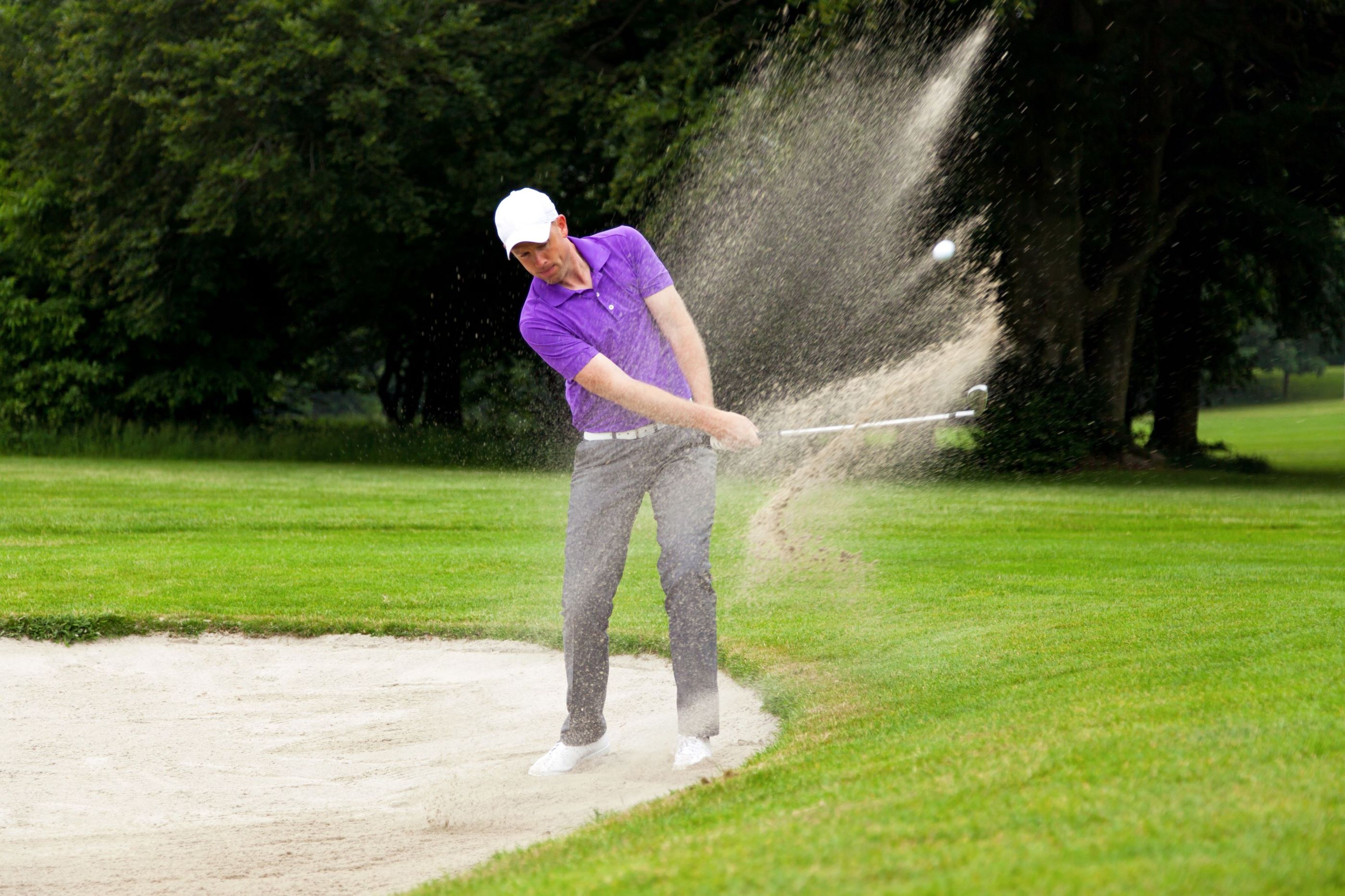 What does Holcim UK’s range of sports sands and rootzones include?